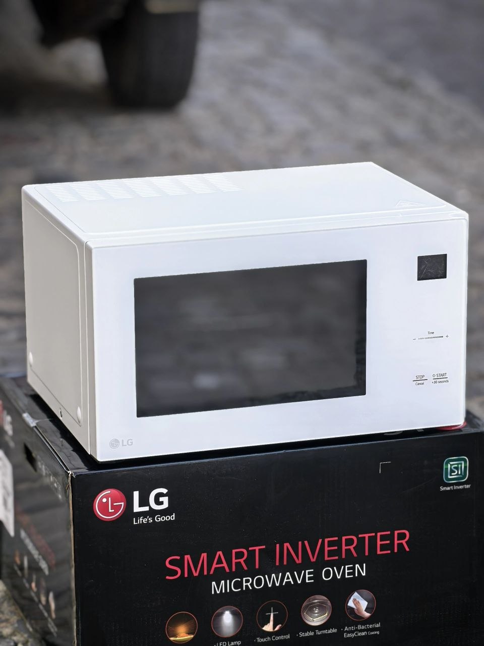خرید مایکروویو ال جی مدل MH8295 ظرفیت ۴۲ لیتر در تاج شاپینگ